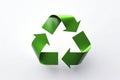 Green glossy recycling icon. 3D illustration, symbol isolated on white background. Shiny plastic three dimensional icon, logo. Royalty Free Stock Photo