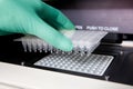 Green gloves, Thermal PCR cycler, Royalty Free Stock Photo