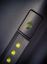 Green glowing power button Closeup shot Royalty Free Stock Photo