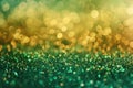 Green and gold bokeh background. Abstract glittering texture with sparkle for design and print Royalty Free Stock Photo
