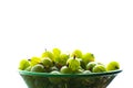 Green gooseberry fruit in a colander on white Royalty Free Stock Photo