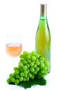 Green grape cluster and wine Royalty Free Stock Photo