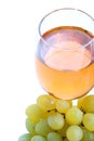 Green grape cluster and wine Royalty Free Stock Photo