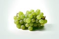 green grapes on a white background with a stem