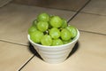 Green grapes in white bowl