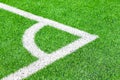 Green grass field and corner lines in an football stadium Royalty Free Stock Photo