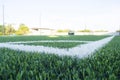 Green grass field for soccer or football competition.Decorate sports game stadium background.Popular foot sport.Fans stadium side Royalty Free Stock Photo