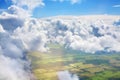 Green grass fields, forests, blue sky and white cumulus fluffy clouds background panoramic aerial view, sunny summer landscape Royalty Free Stock Photo