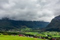 Green grass fields in Norway countryside mountains