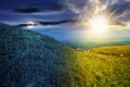 green grass on hillside meadow in high mountains Royalty Free Stock Photo