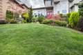 Green Grass Lawn in Manicured Frontyard Garden Royalty Free Stock Photo