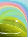 Green grass over a blue sky background a rainbow Royalty Free Stock Photo