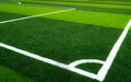 Green grass soccer field. Empty artificial turf football field with white line. View from the corner of soccer field. Sport Royalty Free Stock Photo