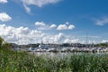 Green grass and yachts in harbor Djurgarden Stockholm Sweden
