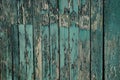 Green gray wooden texture from old frayed fence boards