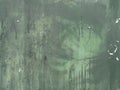 Green grunge metal surface with paint leak marks Royalty Free Stock Photo