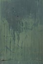 Green grunge metal surface with paint leak marks Royalty Free Stock Photo