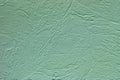 Green grunge structural plaster pattern