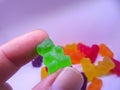 Green gummy bear candy from the pack Royalty Free Stock Photo