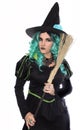 Green Haired Witch with Broom Wearing Witch Hat