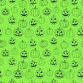 Green halloween vector print seamless pattern with jack-o-lantern pumpkin.