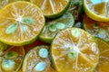 Green halved lemon fruits