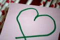 Green hand drawn heart shape. Royalty Free Stock Photo