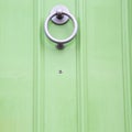 green handle in london antique brown door rusty brass nail an Royalty Free Stock Photo