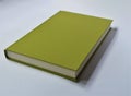 Green hardcover book front view with white background Royalty Free Stock Photo