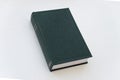 green hardcover book on white background copy space Royalty Free Stock Photo