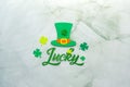 Green Hat with Lucky lettering decoration and cloverleafs.