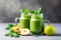 green health smoothie with kale leaves, lime, apple, kiwi, grapes, banana, avocado and lettuce Royalty Free Stock Photo