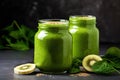 green health smoothie with kale leaves, lime, apple, kiwi, grapes, banana, avocado and lettuce Royalty Free Stock Photo