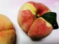 Green and healthy big peach. Royalty Free Stock Photo