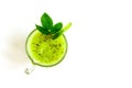 Green healthy cocktail of kiwi, green apple, lime and mint isolated on white background top view Royalty Free Stock Photo