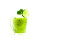 Green healthy cocktail of kiwi, green apple, lime and mint isolated on white background view of a crook Royalty Free Stock Photo