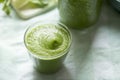 Green healthy cocktail, smoothie. With pear, apple, celery, cabbage, spinach. Royalty Free Stock Photo