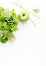 Green healthy drink ingredients on white background: lime, apple, fresh mint and colorful paper straws. Vegetarian food. Detox Royalty Free Stock Photo