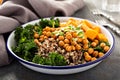 Green and healthy grain bowl with roasted chickpeas Royalty Free Stock Photo