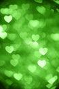 Green heart bokeh background photo, abstract holiday backdrop Royalty Free Stock Photo