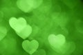 Green heart bokeh background photo, abstract holiday backdrop Royalty Free Stock Photo