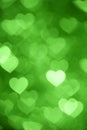 Green heart bokeh background photo, abstract holiday backdrop Royalty Free Stock Photo