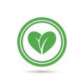 Green heart leaf logo in a circular frame, symbolizing nature and wellness Royalty Free Stock Photo