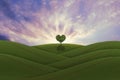 Green heart shaped tree on a hill Royalty Free Stock Photo