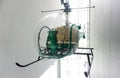 Green helicopter inside building Royalty Free Stock Photo