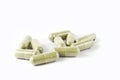 Green herbal medicine capsule isolated