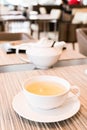 Green herbal tea in a restaurant, five o\'clock