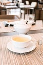 Green herbal tea in a restaurant, five o\'clock