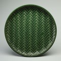 Green Herringbone Plate: A 3d Twill Pattern Decorated Round Plate Royalty Free Stock Photo