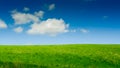 Green hill and blue sky Royalty Free Stock Photo